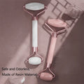 Face and neck massager roller in pink and white, made of safe, odorless resin for effective skincare massage.