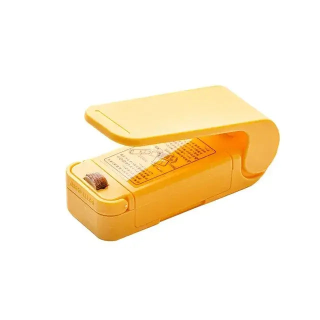 Mini heat bag sealing machine in yellow, ideal for resealing snacks and preserving freshness.