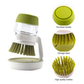 Multifunctional kitchen cleaning brush with soap dispenser, featuring a rounded handle and high-quality bristles.