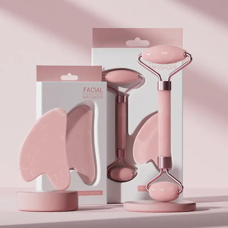 Face and neck massager roller set in pink packaging for skincare enhancement and relaxation.