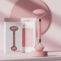 Pink face and neck massager roller with packaging, ideal for skincare and facial relaxation.