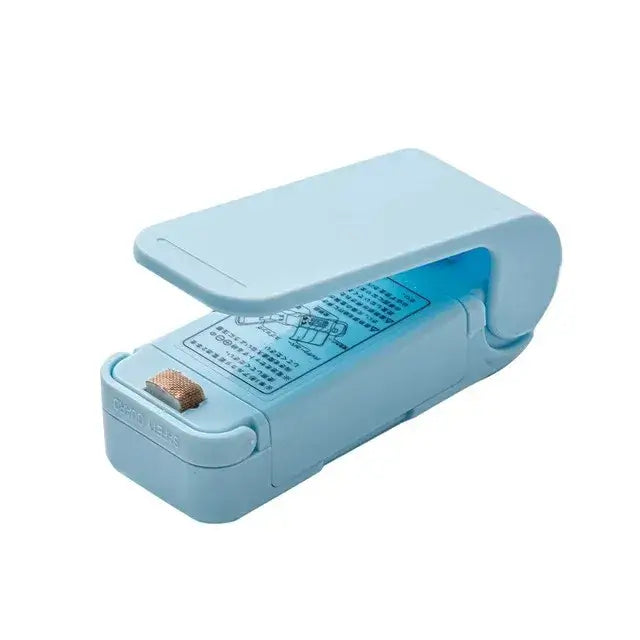 Mini heat bag sealing machine in light blue design, compact and portable for sealing snacks and preserving freshness.